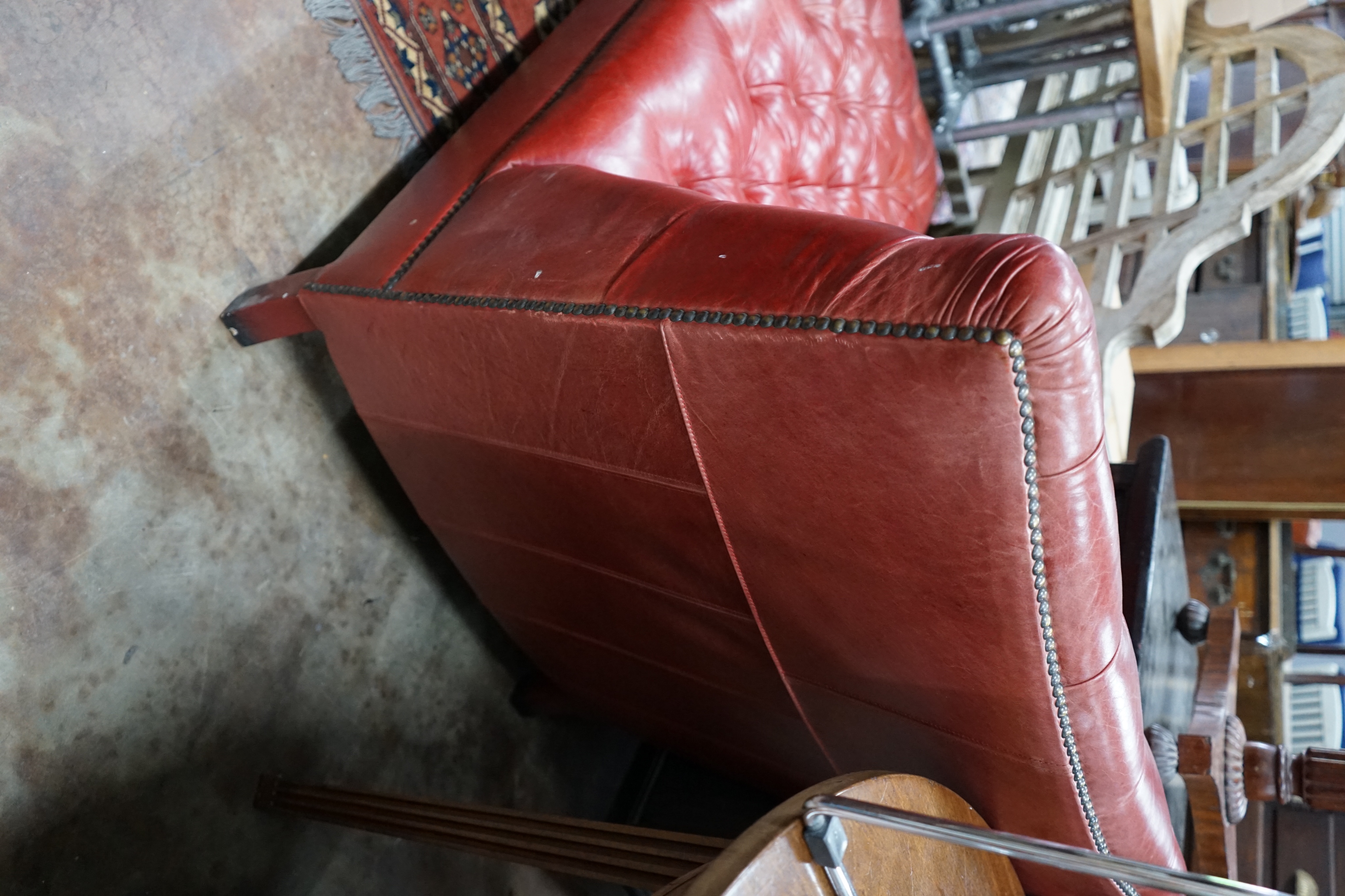 A John Lewis 'Hamlet' red leather chaise longue, width 140cm depth 72cm height 84cm